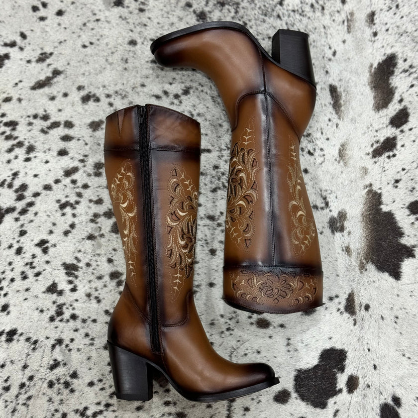 BOTA VANIDOSA MIEL TUVO ALTO